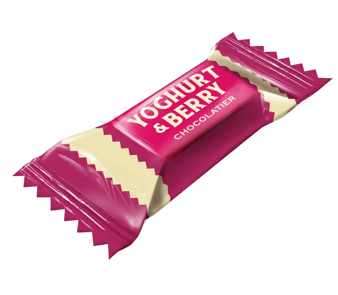 Цукерки YOGHURT & BERRY 1 кг від Millennium - шоколадні цукерки з ніжною йогуртовою начинкою та насиченим ягідним смаком у рожево-кремовій упаковці з білим написом.
